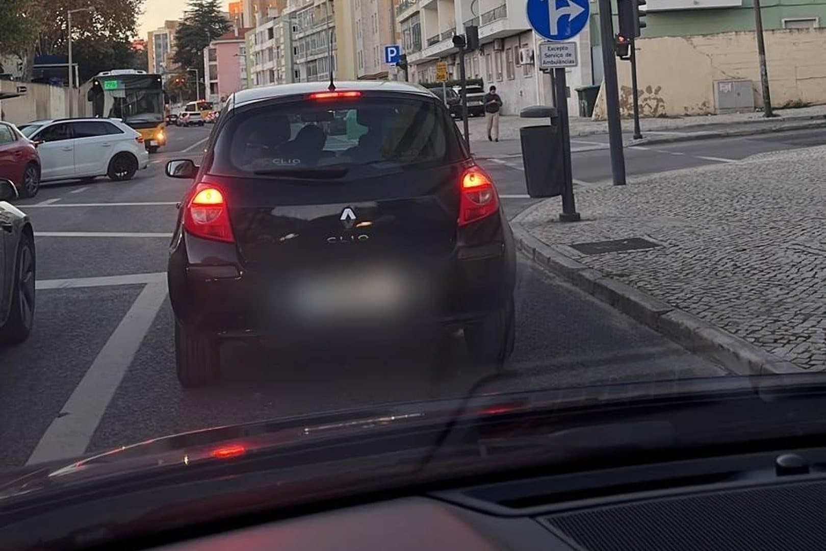 Traffic on a street in an urban residential area
