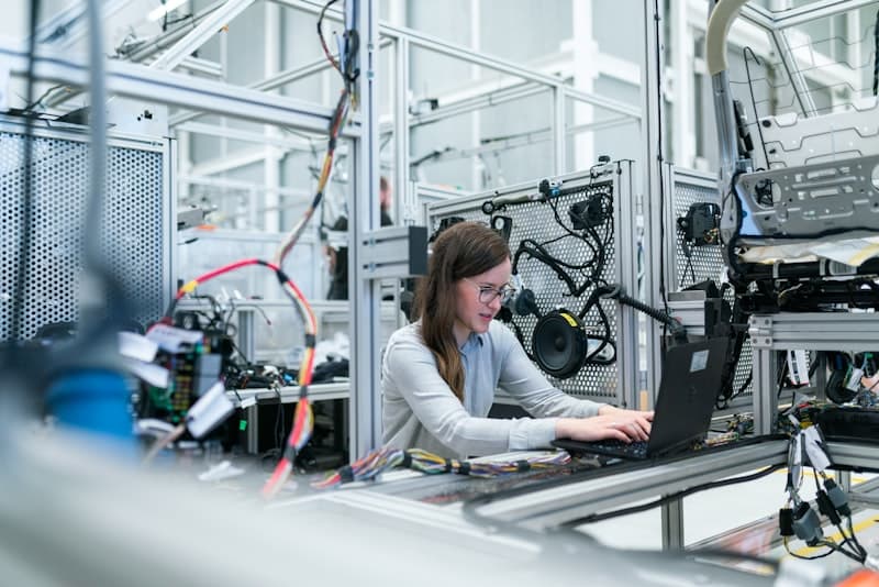 Engineer and sales manager in an industrial warehouse